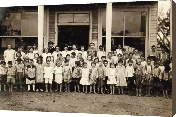 SCHOOL CHILDREN, 1914. A group of children attending a mill school at Barker Cotton