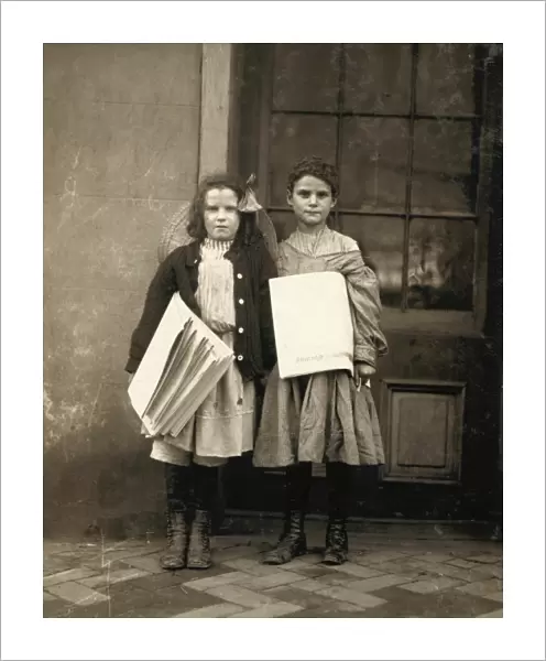 DELAWARE: NEWSGIRLS, 1910. Girls selling papers at Wilmington, Delaware. Photograph by Lewis Hine