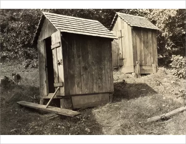 HINE: RURAL SCHOOL, 1921. The outhouses at a rural school in Marey, West Virginia