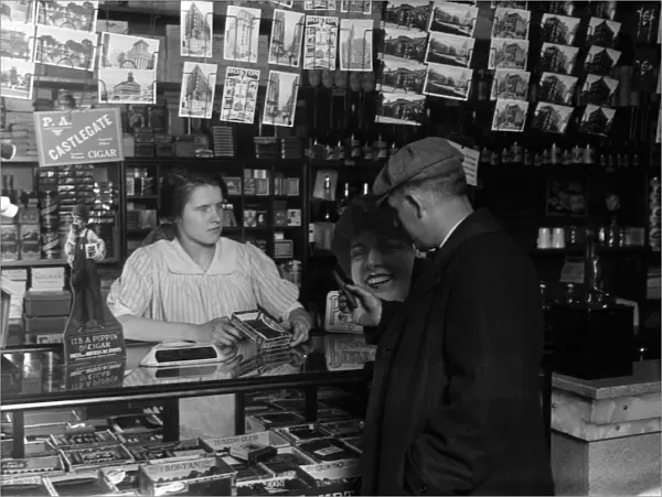 HINE: CIGAR STORE, 1917. 14-year-old Mary Creed selling cigars in a store in Boston