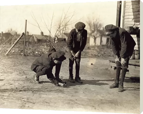 HINE: SHOOTING MARBLES, 1908. Young doffers at the Kesler Mfg
