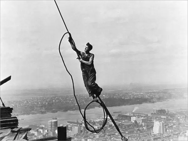 HINE: STEELWORKER, 1931. Steelworker atop the Empire State Building, New York City