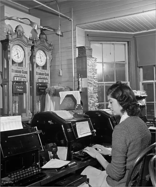 ARIZONA: TELEGRAPH, 1943. Teletype operator in the telegraph office of the Atchison