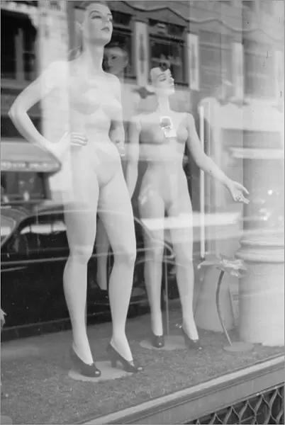 WINDOW DISPLAY, 1941. Mannequins in a department store window in Chicago, Illinois