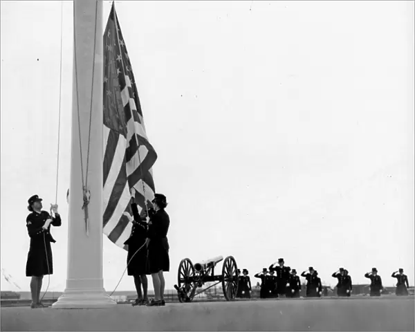 WOMEN MARINES, 1968. Women Marines raising the flag at Marine Corps Base Camp Pendleton