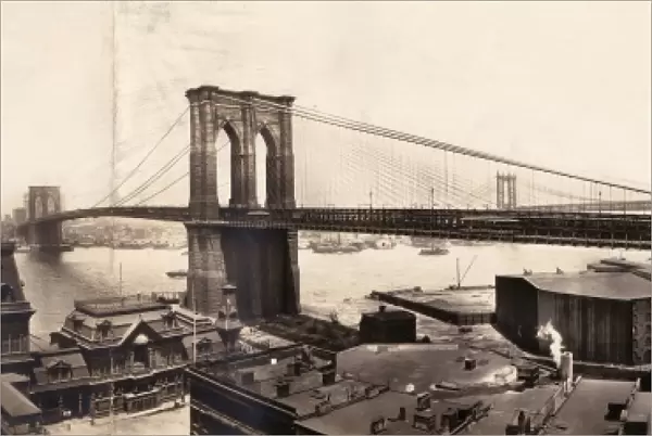 BROOKLYN BRIDGE, c1913. Panoramic view of the Brooklyn Bridge from Brooklyn, with Manhattan