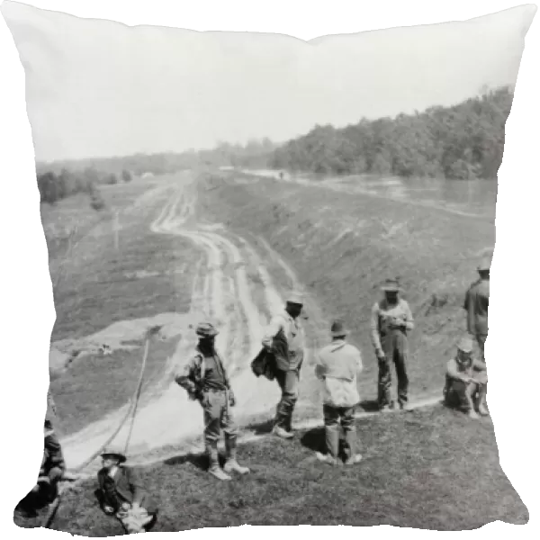 ARKANSAS: HELENA, 1927. Men resting on a levee, Helena, Arkansas