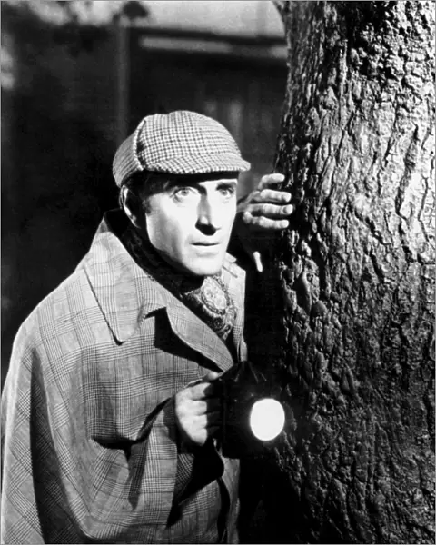 SHERLOCK HOLMES. Basil Rathbone (1892-1967). English actor. In the role of Sherlock Holmes