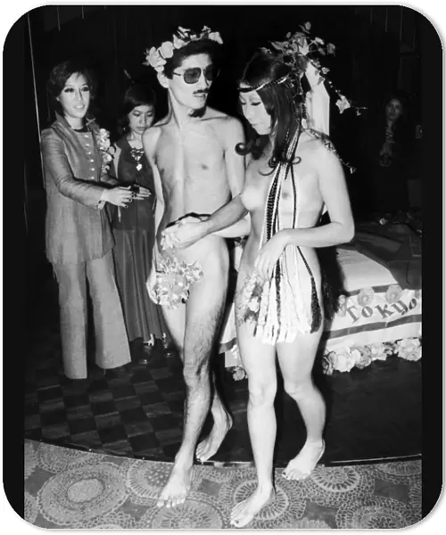 JAPAN: NUDE WEDDING, 1970. Bride and groom, both fashion designers, photographed at their nude wedding in a Tokyo nightclub, November 1970