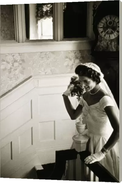 JACQUELINE KENNEDY (1929-1994). Wife of President John F. Kennedy. Photographed before the bouquet toss on her wedding day, 12 September 1953. Photograph by Toni Frissell