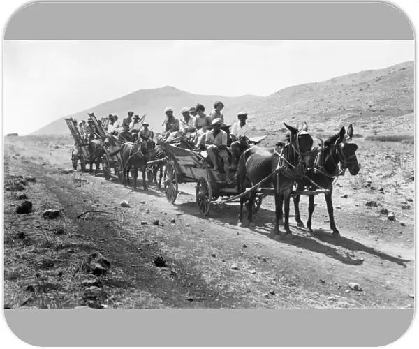 PALESTINE COLONISTS, 1920. Jewish colonists en route to a settlement in Palestine, 1920
