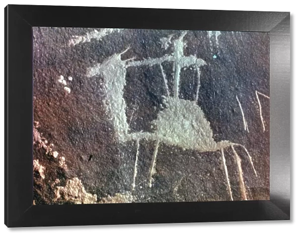 NEOLITHIC PETROGLYPH of a man on a dromedary from Sinai, Israel