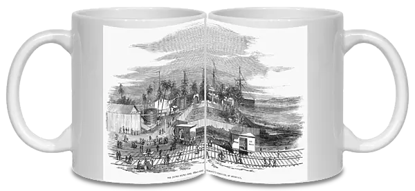 PANAMA RAILWAY, 1855. The United States Mail Steamship Companys premesis, at Aspinwall. Eastern terminus of the Panama Railway at Aspinwall (now Colon). Wood engraving, English, 1855