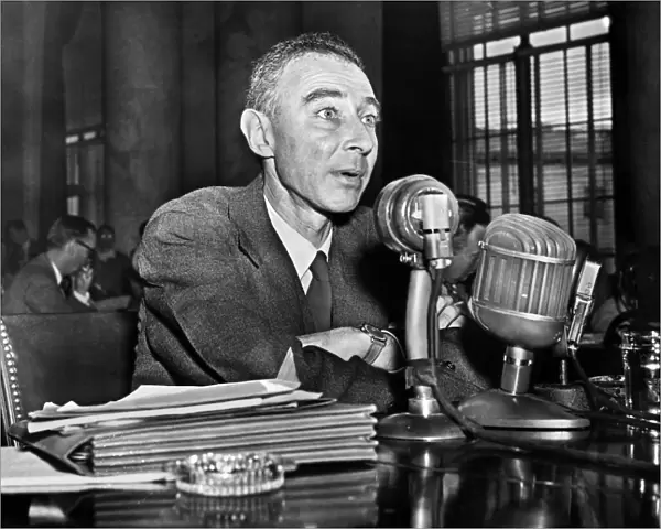 (1904-1967). American physicist. Oppenheimer testifying before the Joint Congressional Atomic Committee as Chairman of the Atomic Energy Commission. Photographed 13 June 1949
