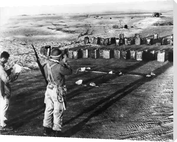 Israeli soldiers taking position at the demarcation line to Egypt before outbreak of conflict. Photograph, October 1956