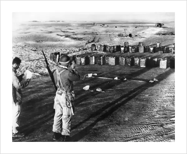 Israeli soldiers taking position at the demarcation line to Egypt before outbreak of conflict. Photograph, October 1956