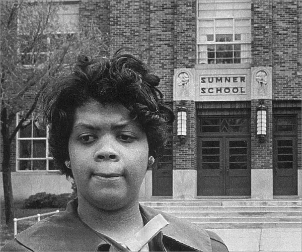 (1943- ). African American student who was barred from attending Sumner School in Topeka in 1951, and led to the Supreme Court case, Brown vs. the Board of Education. Brown photographed in front of the school in 1964