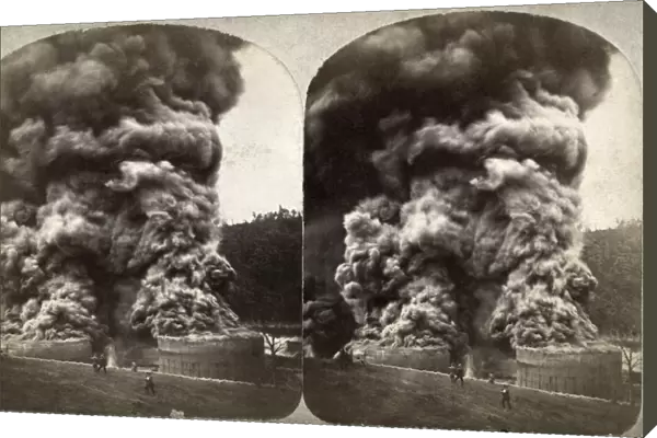 Two oil storage tanks burst into flames at the Imperial Refinery near Oil City, Pennsylvania. Stereograph, c1875