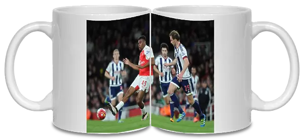 Alex Iwobi (Arsenal) Craig Dawson (WBA). Arsenal 2: 0 West Bromwich Albion