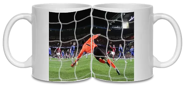 Robin van Persie shoots past Chelsea goalkeeper Petr