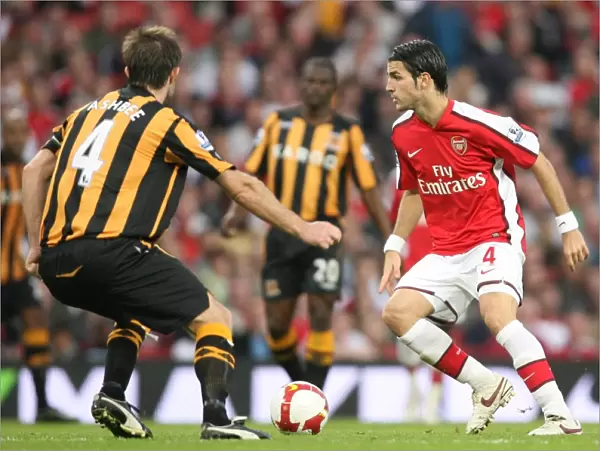 Cesc Fabregas (Arsenal) Ian Ashbee (Hull)