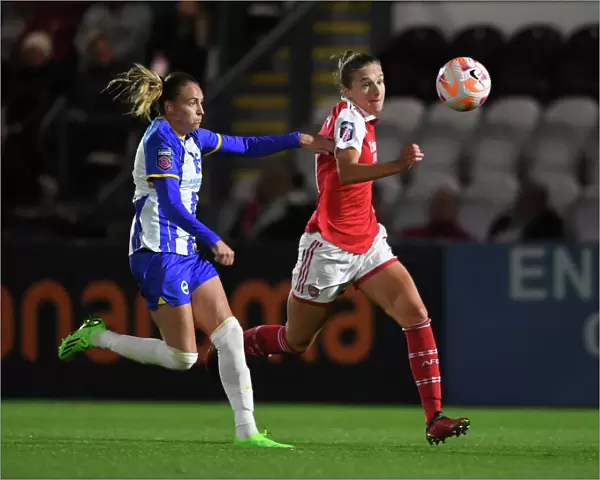 Arsenal's Vivianne Miedema Chases Down Brighton's Kayleigh Green in Thrilling WSL Clash
