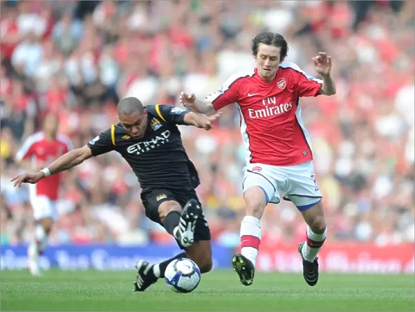 Tomas Rosicky (Arsenal) Nigel De Jong (Man City). Arsenal 0: 0 Manchester City