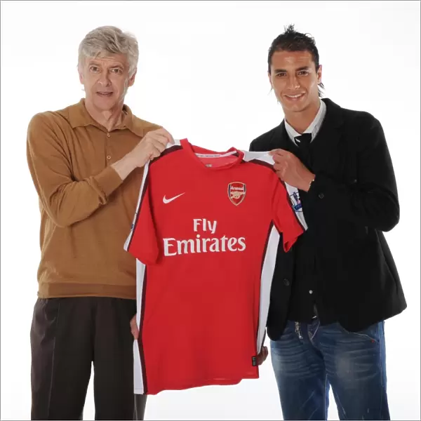 New Arsenal signing Marouane Chamakh with manager Arsene Wenger. Arsenal Training Ground