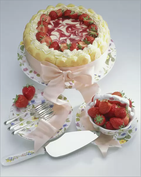 Strawberry charlotte on floral plate with pink ribbon