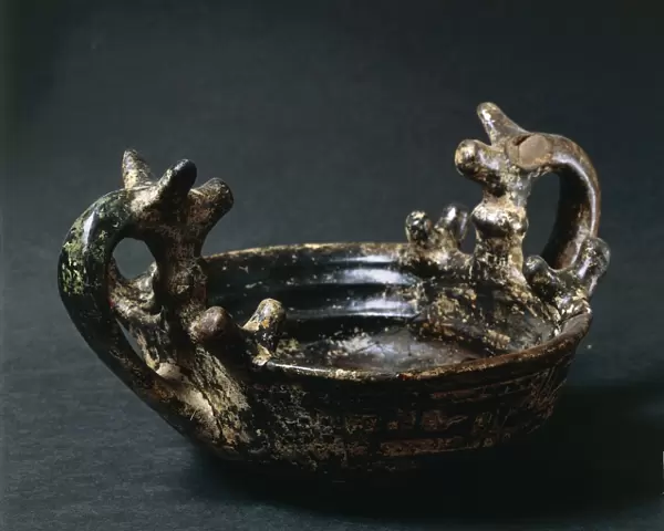 Ceramic vessel with zoomorphic handles, from Grottazzolina, province of Fermo