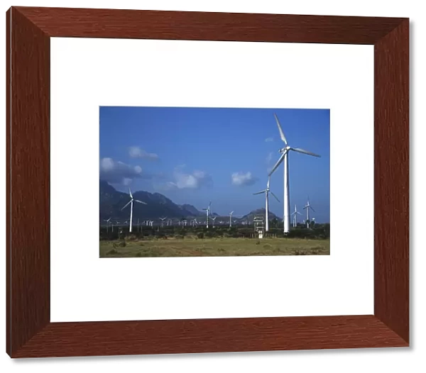 India, Tamil Nadu, wind turbines with the mountains of the Eastern Ghats in the background