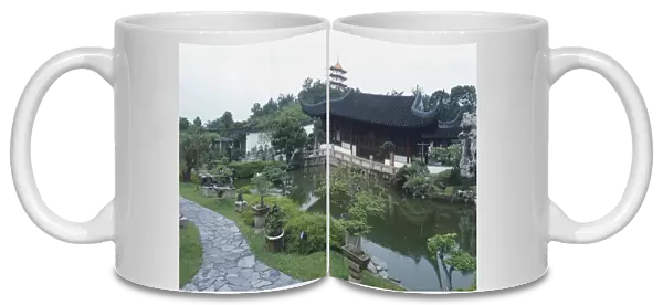 Singapore, Japanese and Chinese gardens, landscaping and ornamental lake, potted bonsai trees, path twisting, traditional pagoda in background