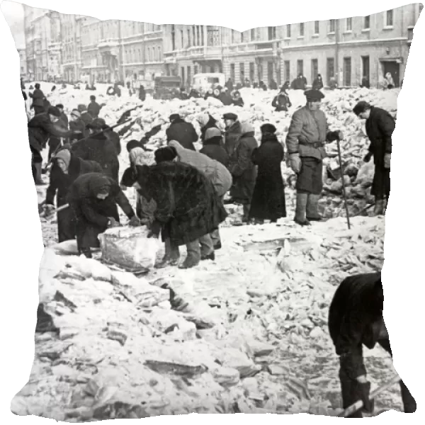 Residents clearing snow and ice from nevsky prospect in leningrad during world war ll, 1942