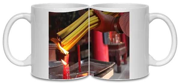 Thien Hau Temple. Burning Incense during Tet, the Vietnamese lunar New Year celebration
