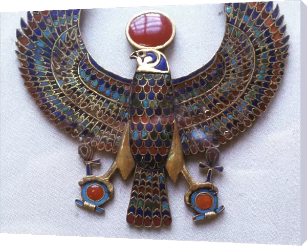 Pectoral jewel from treasure of Tutankhamun showing falcon headed god with sun disk