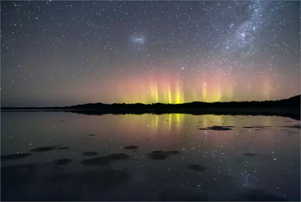 Natures Fireworks, bright beams of the Aurora Australis reflected in water