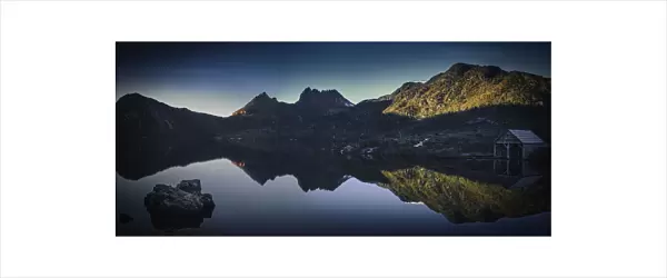 The iconic Dove Lake and boatshed - with Creadle Mountain at the backdrop. Taken during a cloudless morning