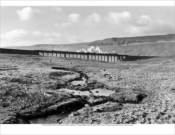 A goods train crossing the Ribblehead Viaduct, North Yorkshire, c 1950s