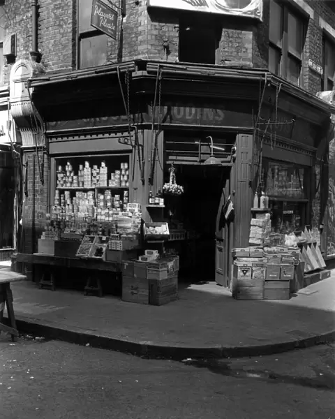The Corner Shop; : A London grocers with goods on display outside