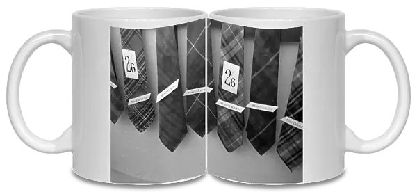 Tie Shop. 15th October 1938: Tartan ties belonging to various Scottish