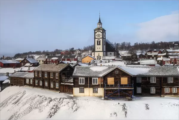 Roros old mining town with church hill in winter