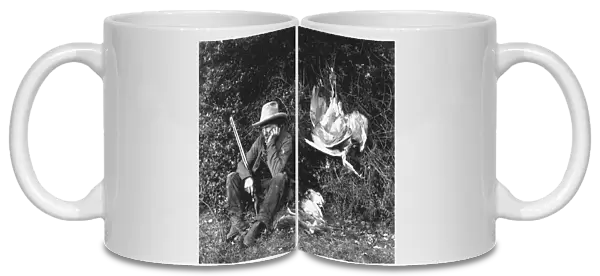 Pot Shot. circa 1857: A hunter with his catch of rabbits and birds