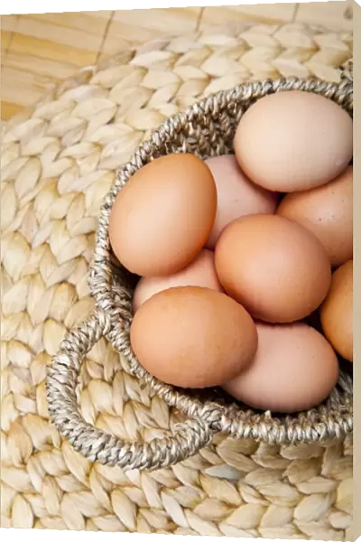 Organic eggs in a basket