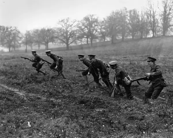 Field Day. 24th February 1928: Eton schoolboys advance