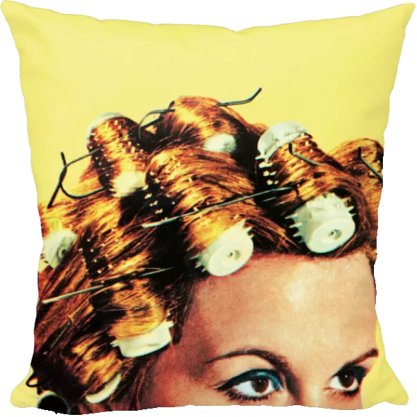 Woman with curlers in her hair