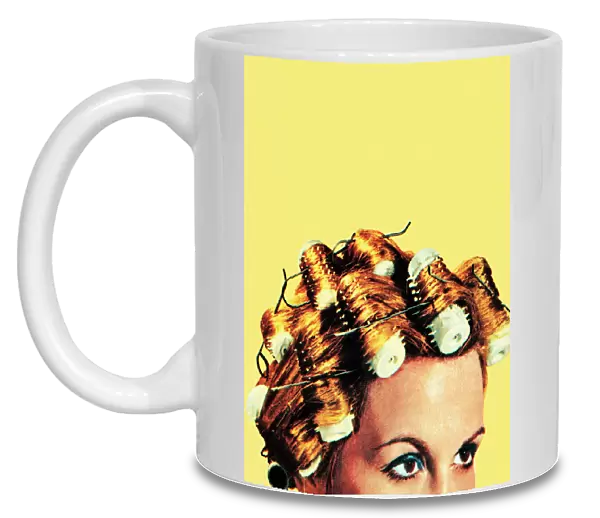 Woman with curlers in her hair