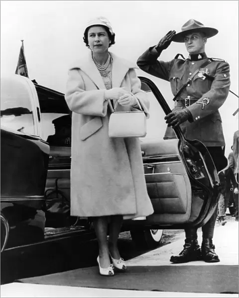 Royal Tour of Canada H. M The Queen is given a salute from a Mountie, a Royal Canadian