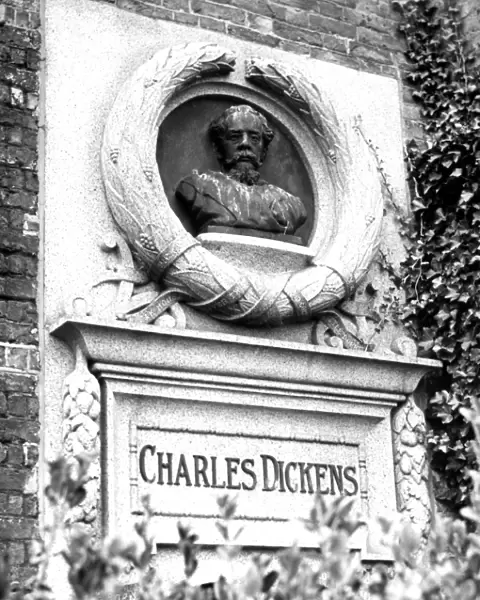 A bust of Charles Dickens on the side of Bleak House which was once his home. Broadstairs