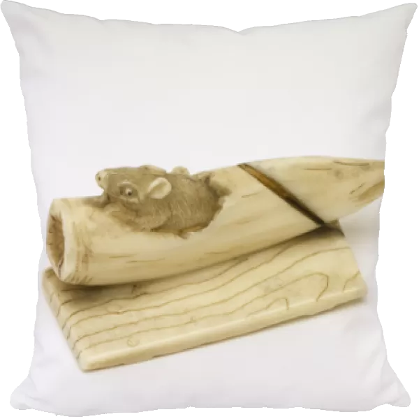 Netsuke of a mouse emerging from a bamboo shoot (ivory)