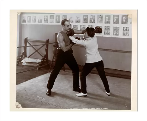 Edna Wallace Hopper posed in a boxing ring with Jack Cooper at his gymnasium at Broadway